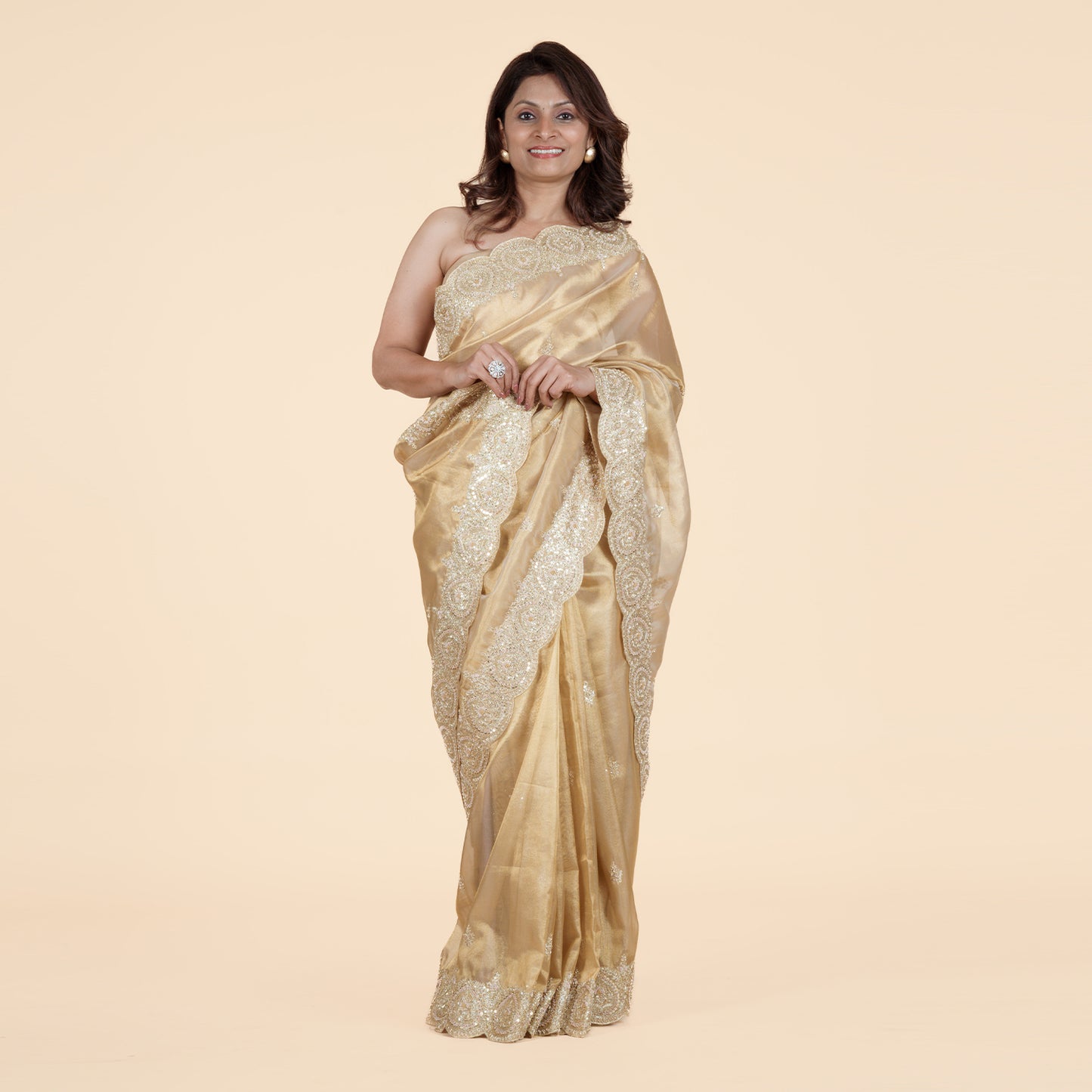 Luxurious Gold Tissue Saree with Cutdana Work